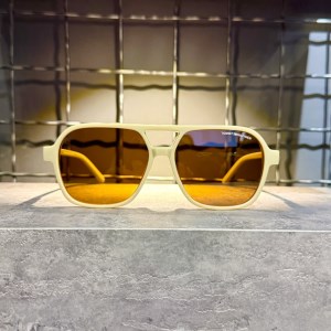 عینک برند TOMMY فریم کائوچویی نسکافه ای /دسته طوسی/شیشه قهوه ای کد 100