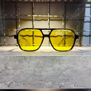 عینک برند TOMMY فریم کائوچویی مشکی /دسته مشکی/شیشه زرد کد 100