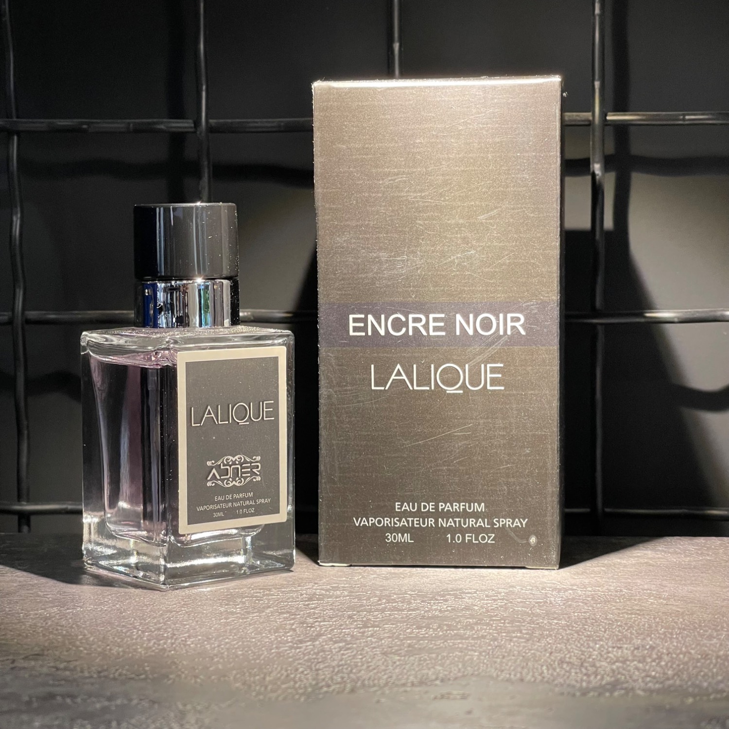 ادکلن 30میل برند اسکلاره با رایحه ENCRE NOIR LALIQUE